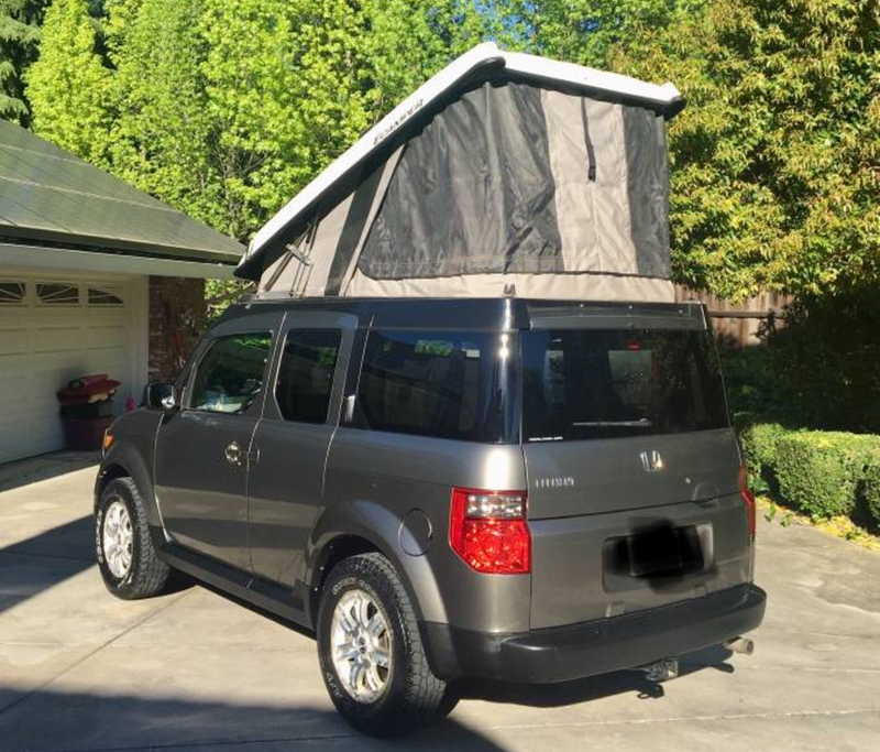 Illustration for article titled At $14,500, Will This Pop-Top 2008 Honda Element Have You Flipping Your Lid?